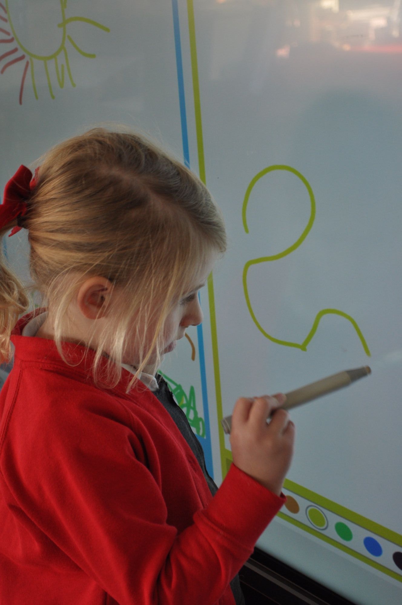 Barming student writing on whiteboard